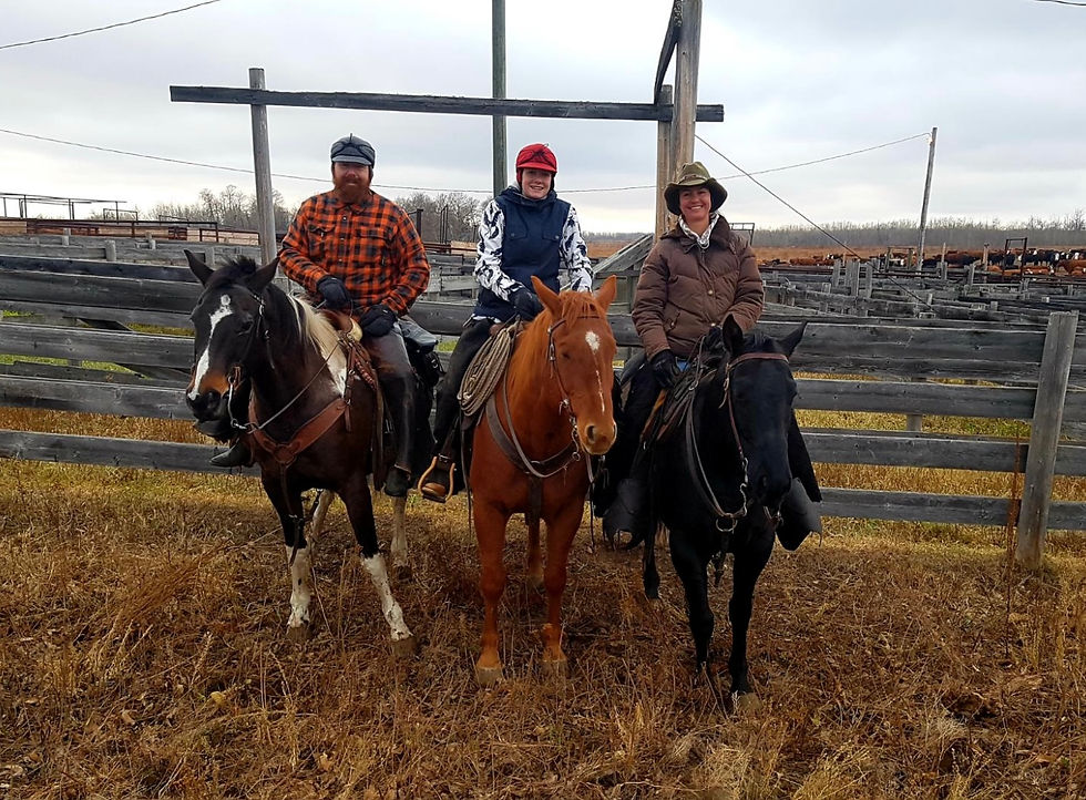 Terry with Daughter Maddie, and Wife Amy, riding at fall Take-out at Rannach Community Pasture in Two Hills County.