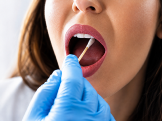 Oral swab specimen collection for drug testing
