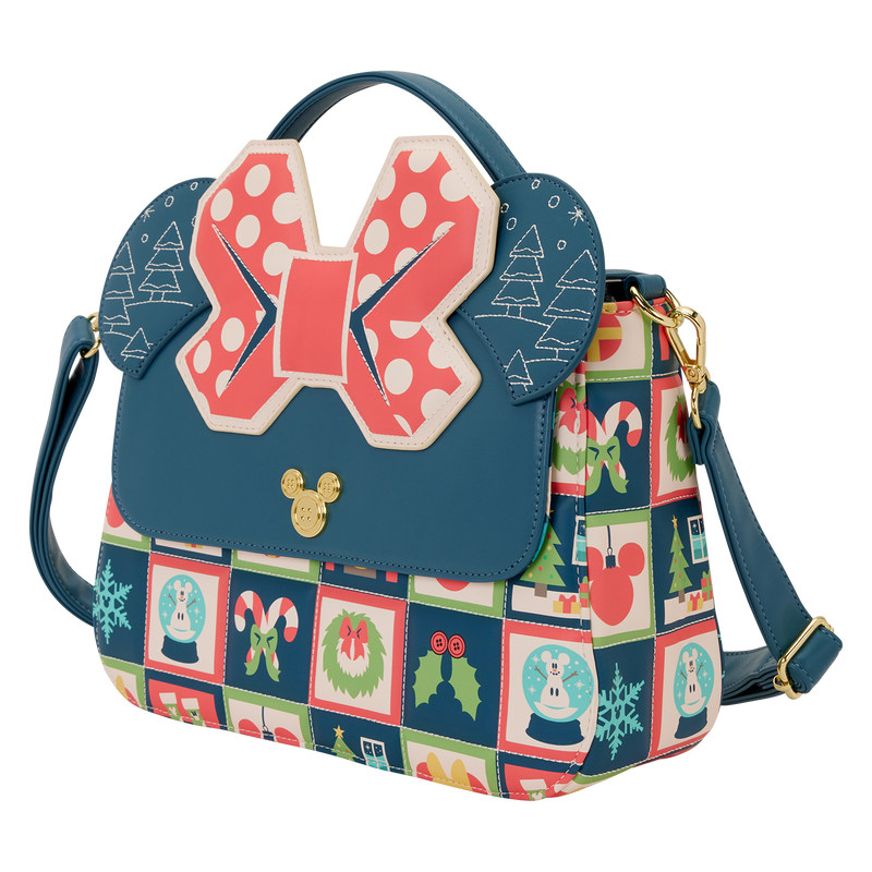Side profile of Minnie Mouse holiday crossbody bag with snow globe and candy cane designs