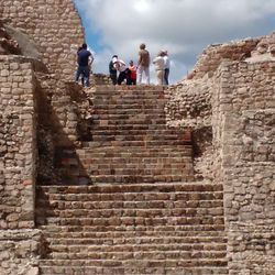 People on the pyramid of Cañada de la Virgen