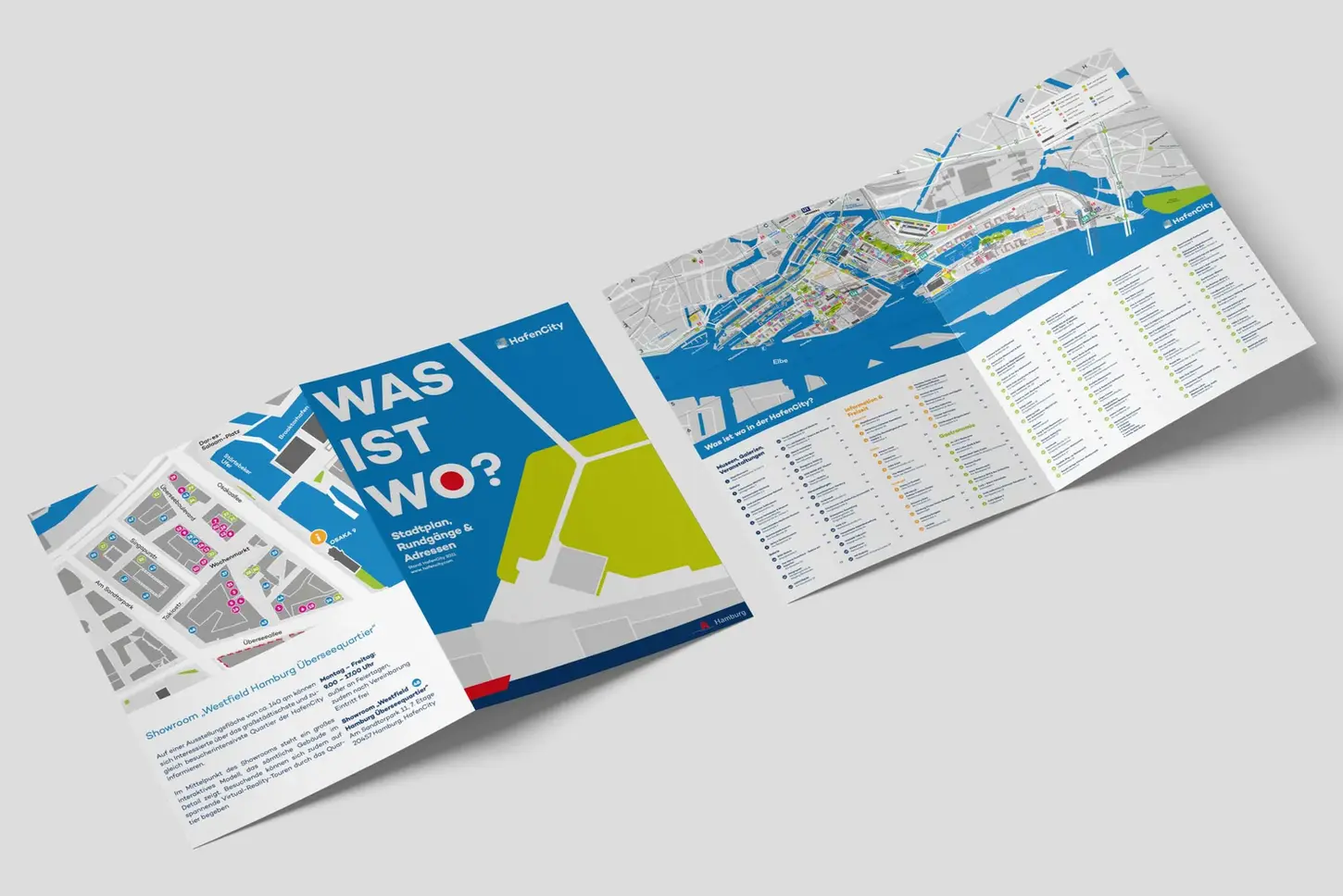 An open folding brochure titled "WAS IST WO?" displaying a map and directory of HafenCity Hamburg. 