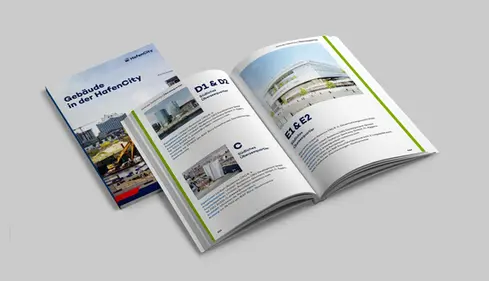 Open brochure 'Gebäude in der HafenCity' displaying modern architectural projects in the Überseequartier.