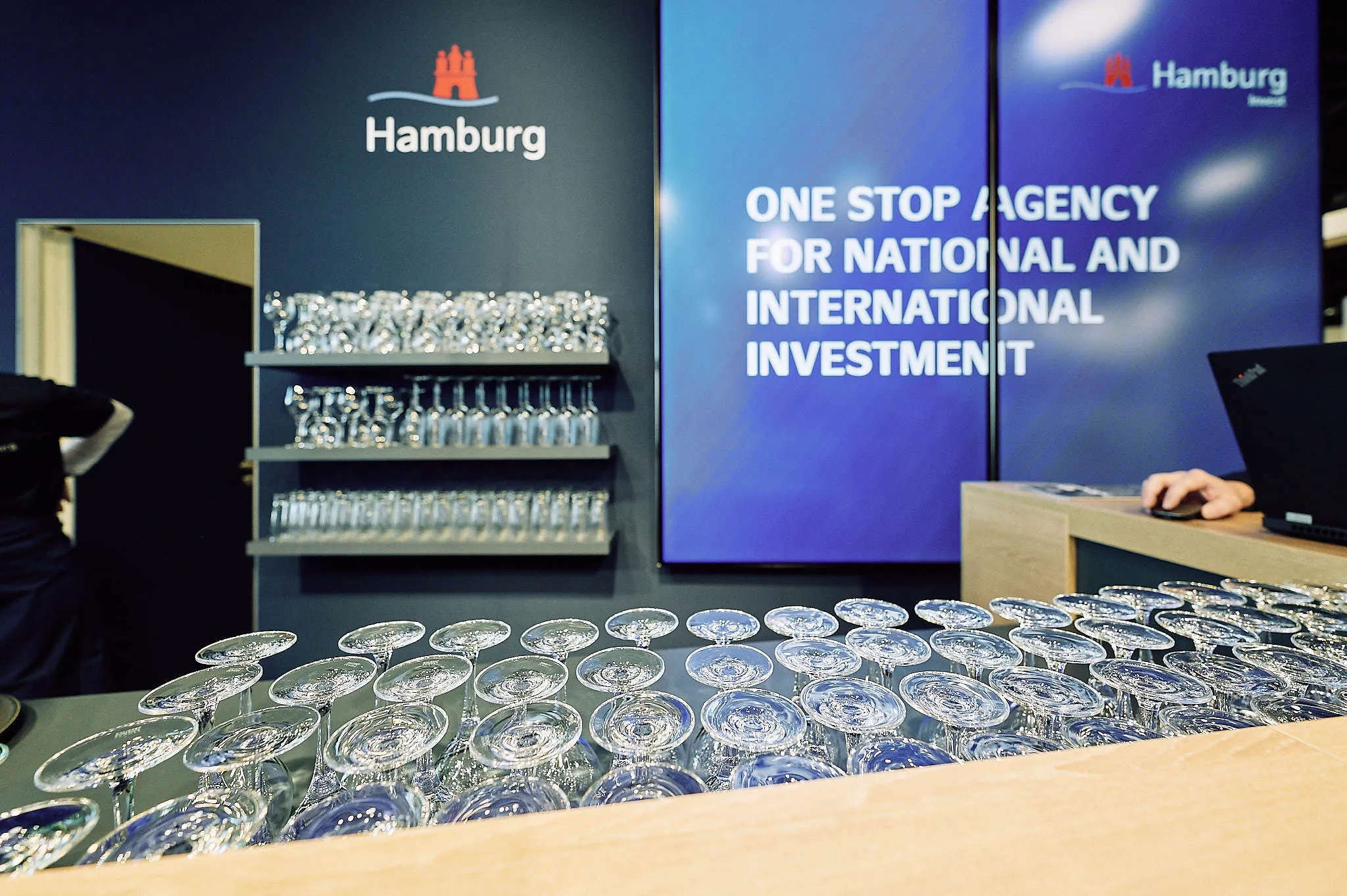 Hamburg Investment agency office with motion graphics screen.