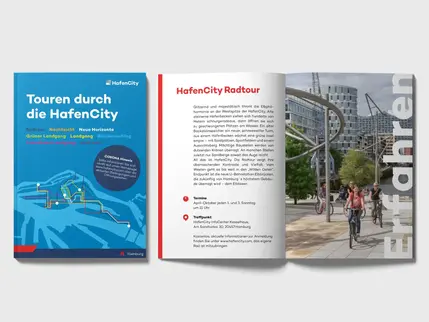 "Touren durch die HafenCity" showing its blue cover next to an open page spread about bike tours.