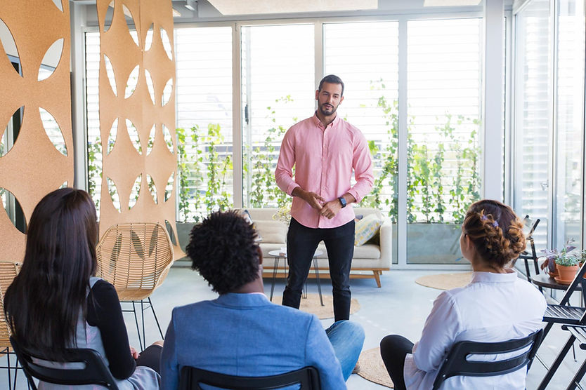 confident-male-speaker-holding-seminar.jpg