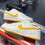 Thumbnail: White University Gold Dunk Low: 12