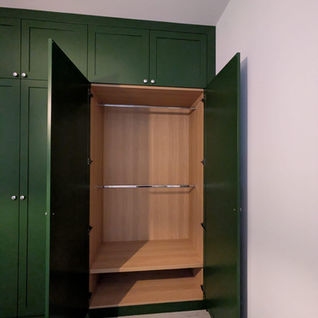 green wardrobes with full oak internals and hanging and drawers