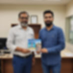 freepik__two-indian-men-in-an-office-setting-the-man-on-the__70146.jpeg