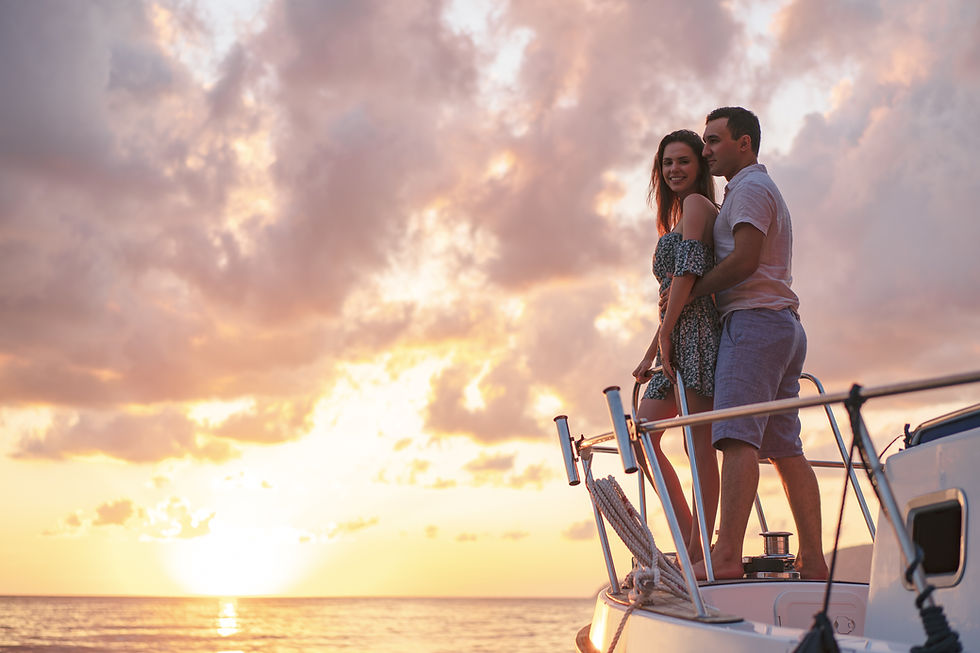 beautiful-couple-looking-sunset-from-yacht.jpg