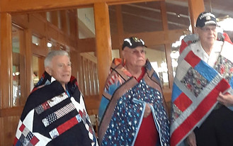 Recipients wearing their quilts-fuzzy.jpg