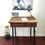 Miniature : bureau en bois et piètement en métal avec rangement sous plateau