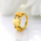 anillo dorado de acero con tres osos