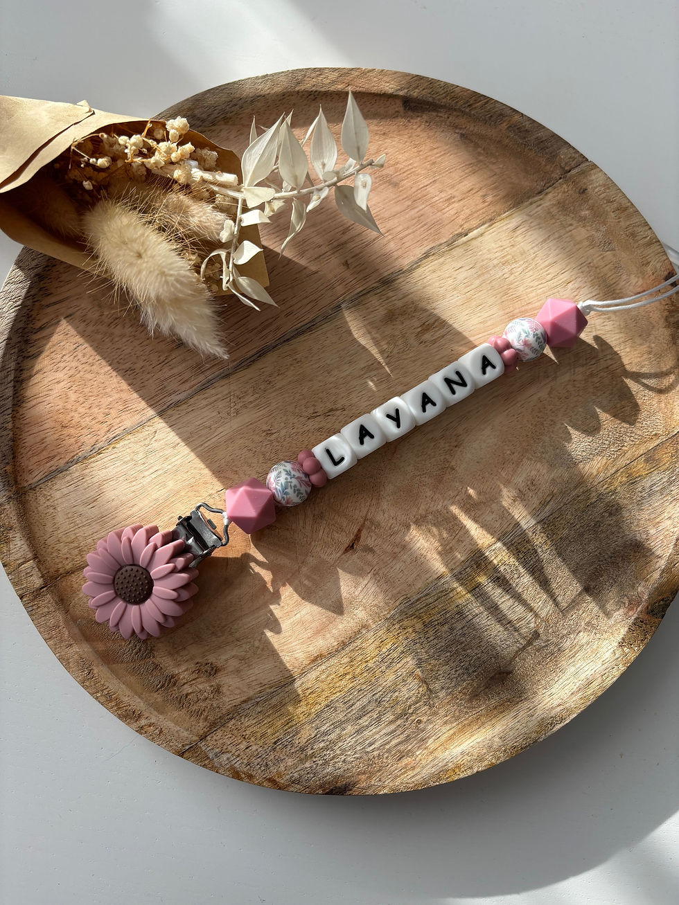 Attache tétine fleur