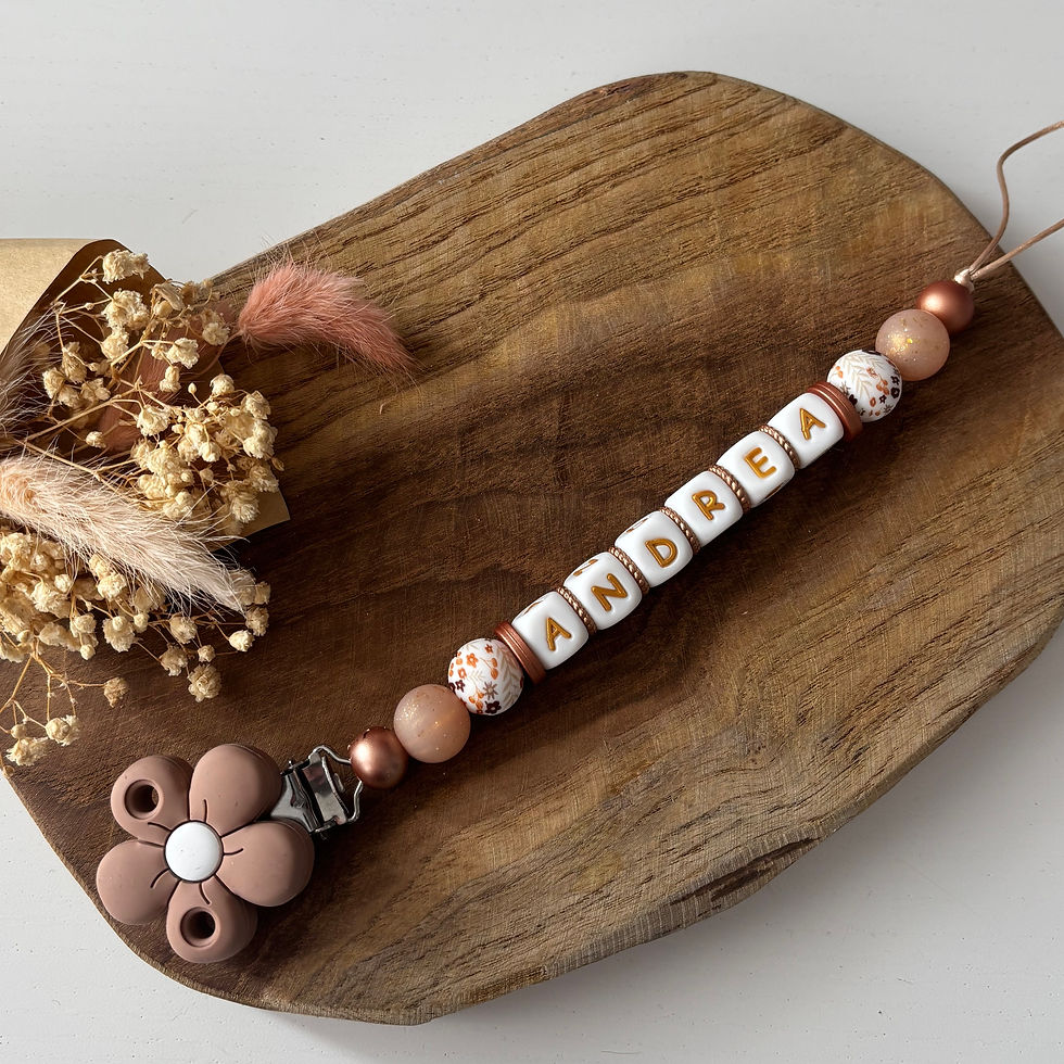 Attache tétine fleurs