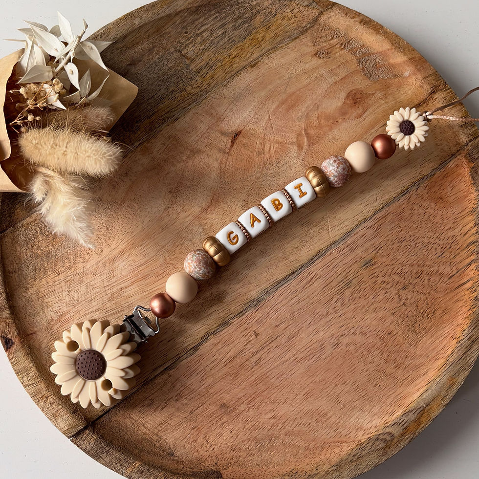 Attache tétine fleurs