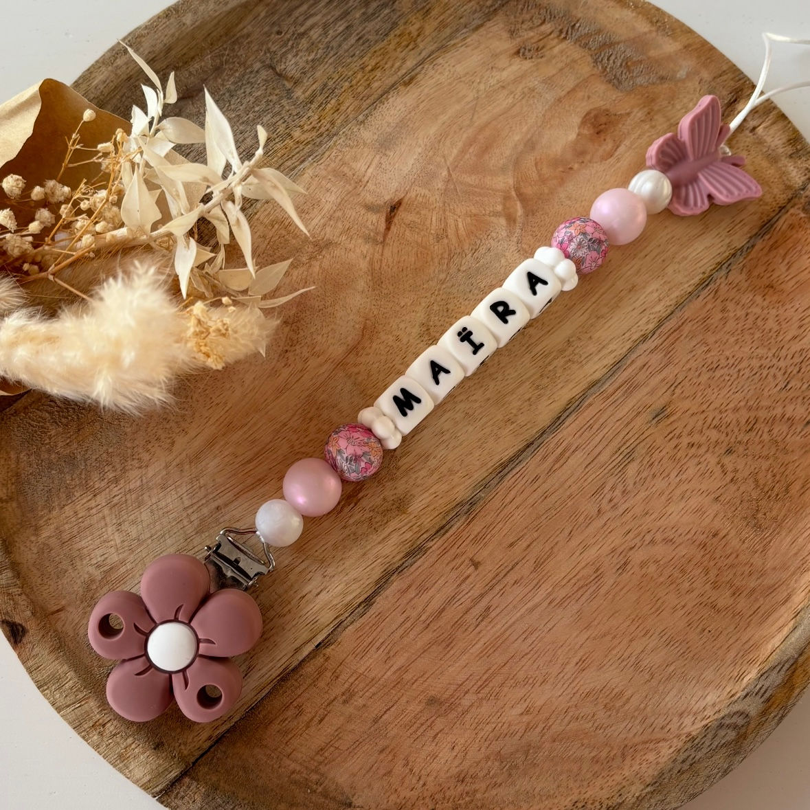  Attache tétine fleur et papillon 