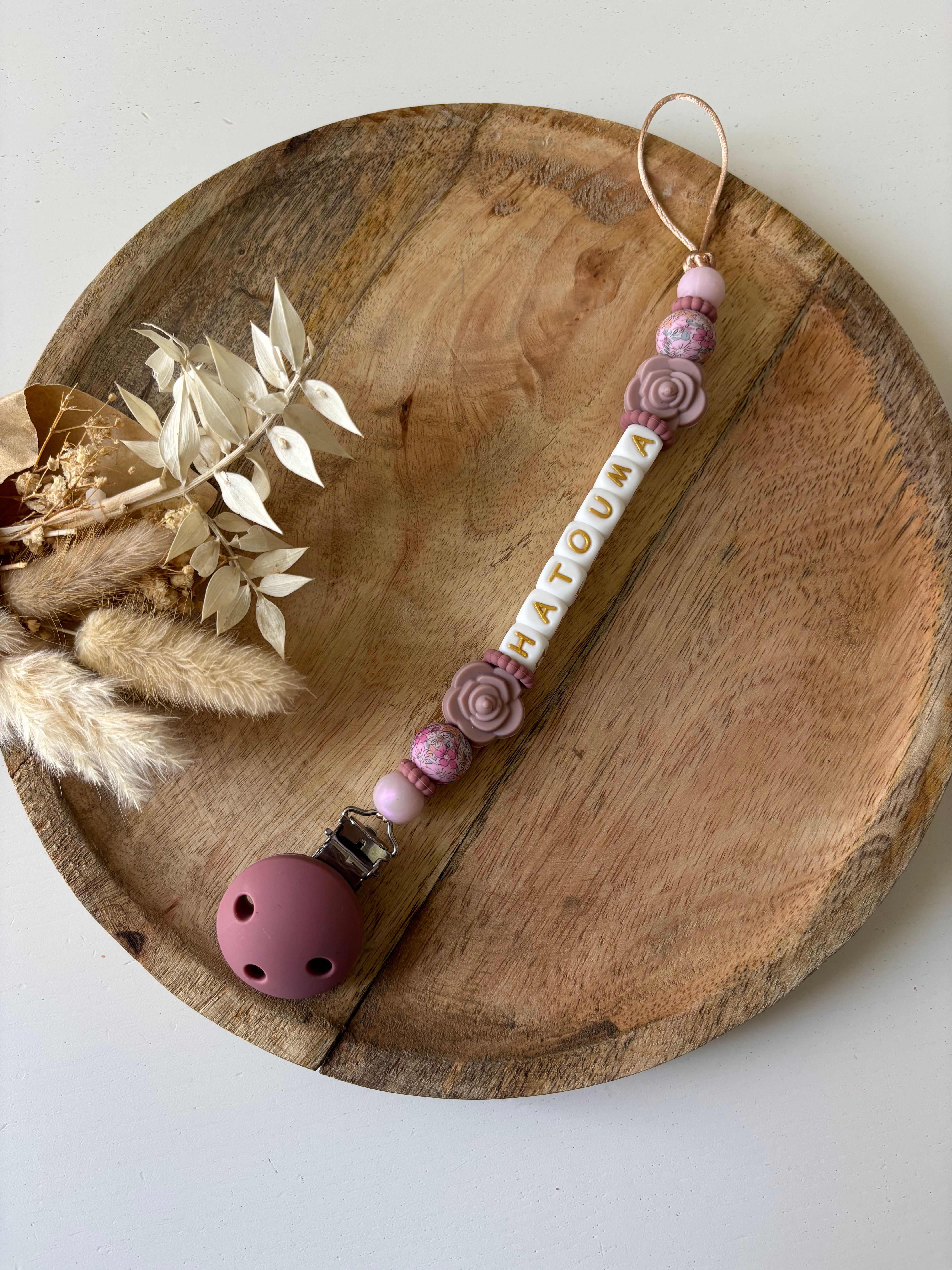 Attache tétine fleur 