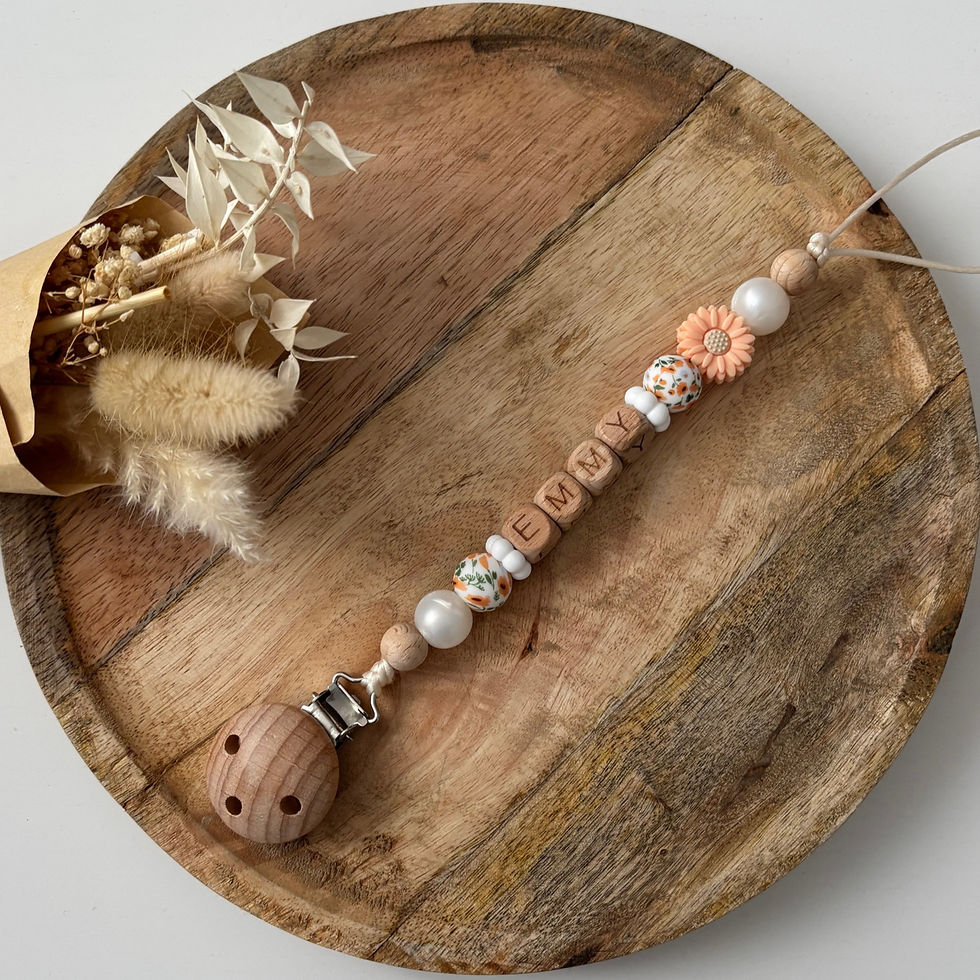 Attache tétine fleur