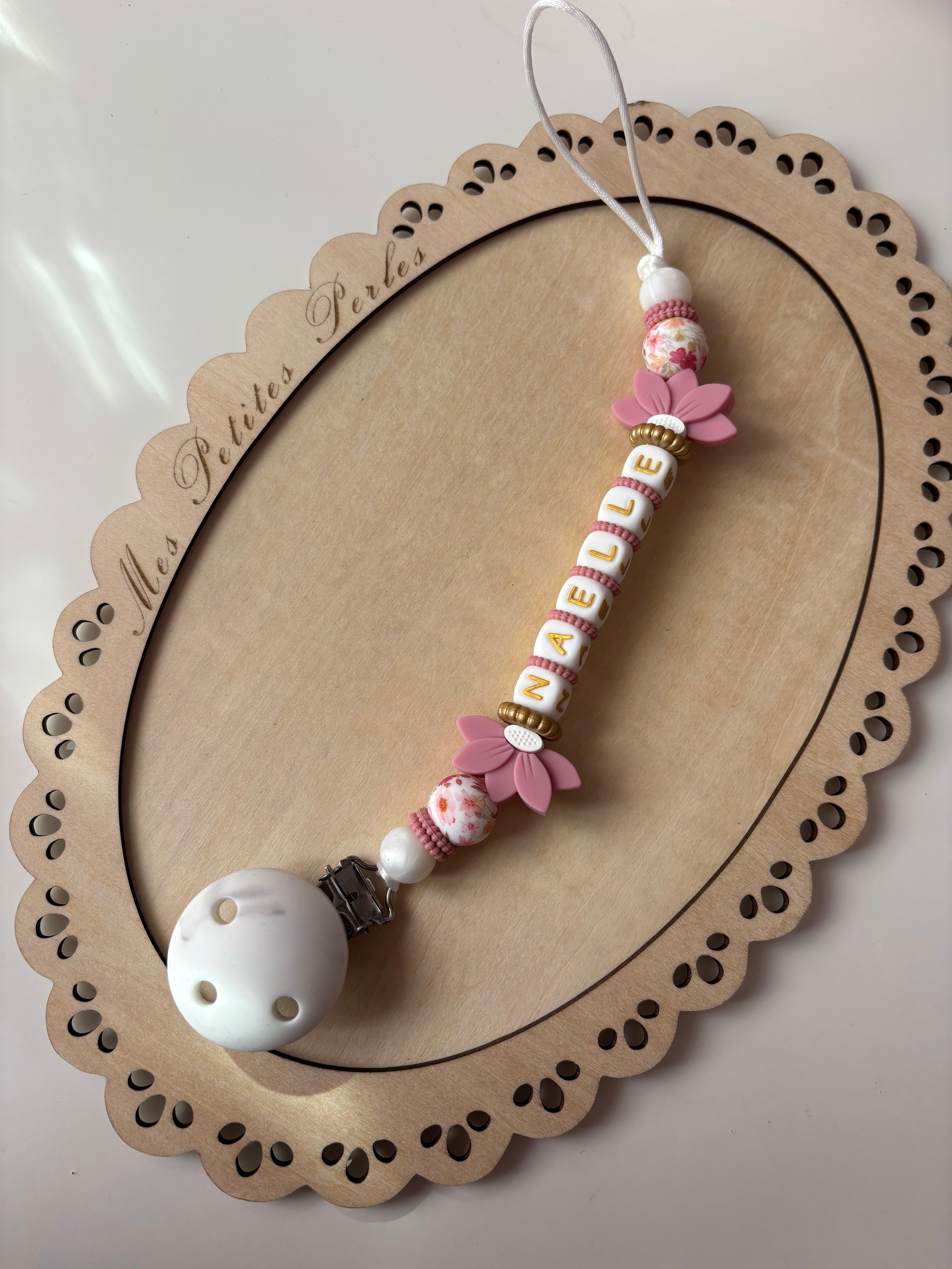 Attache tétine fleur