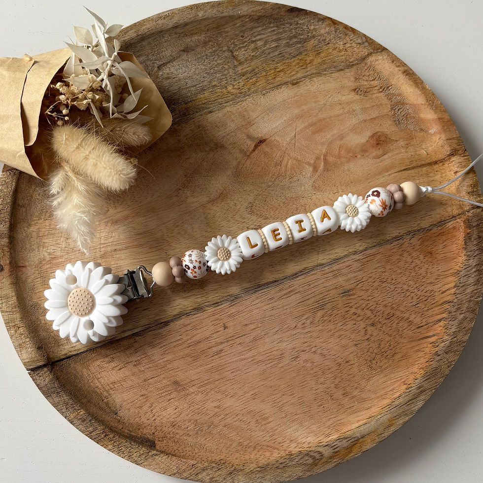 Attache tétine fleurs