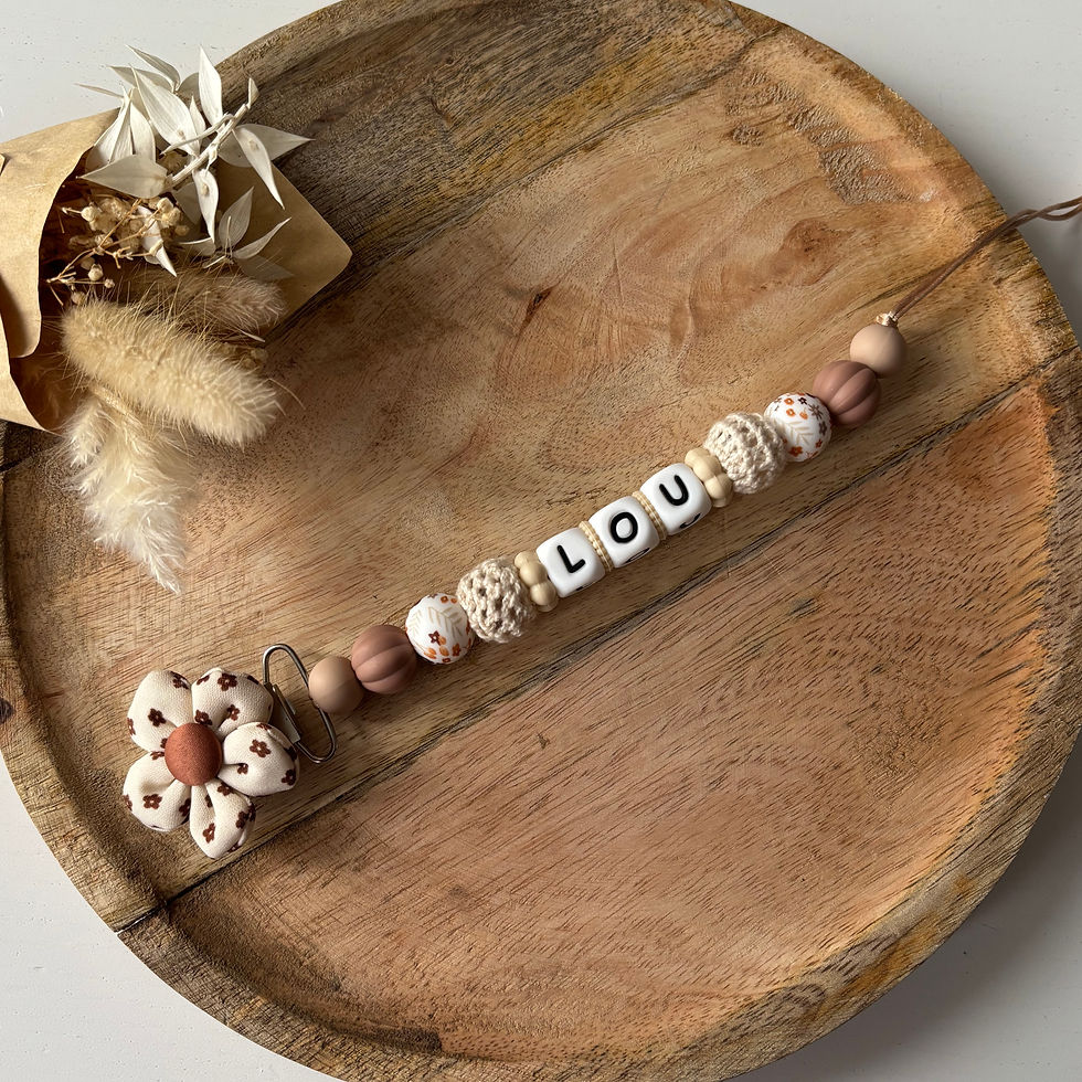 Attache tétine fleurs