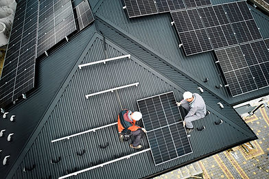 men-workers-installing-solar-panels-on-roof-of-hou-2025-01-16-23-13-12-utc.jpg