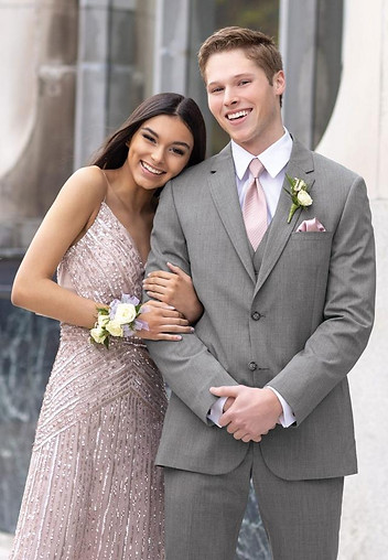 Medium grey suit with blush pink accessories for prom guys, available for rental in Indianola, Iowa.