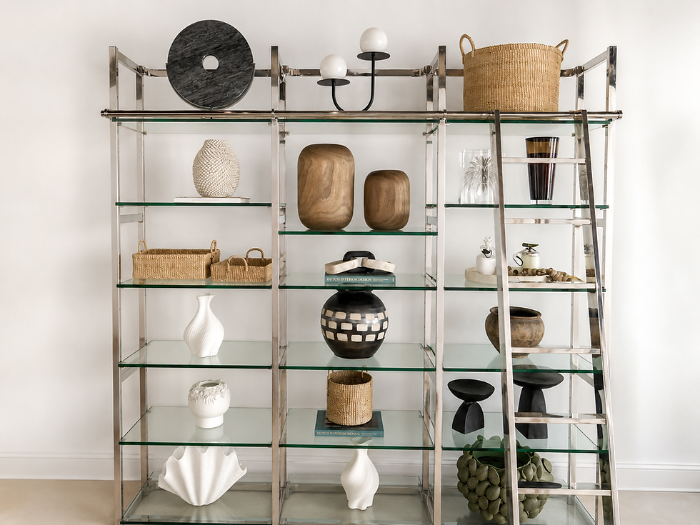 Modern glass shelf gallery with vases and decor.