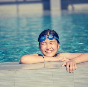 happy-girl-swimming-in-pool