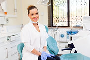 female dentist and dental chair