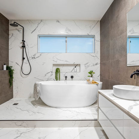 Modern bathroom renovation: freestanding tub, double vanity