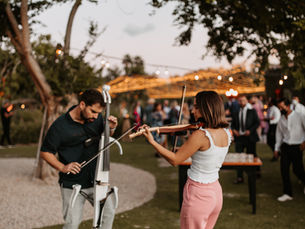 Elena and Roberto, CaboStrings duo for wedding events in Los Cabos, Mexico