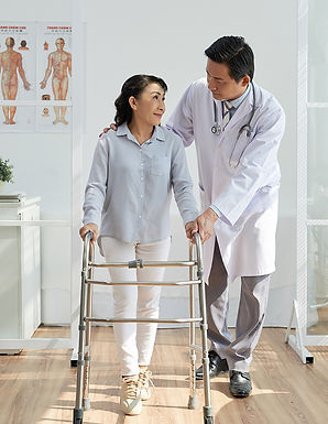asian-physiotherapist-with-patient.jpg