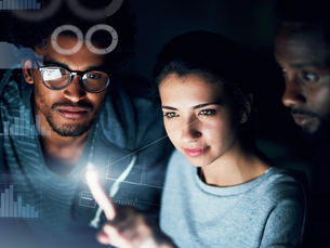 DevOps team reviewing monitoring within CI/CD pipeline