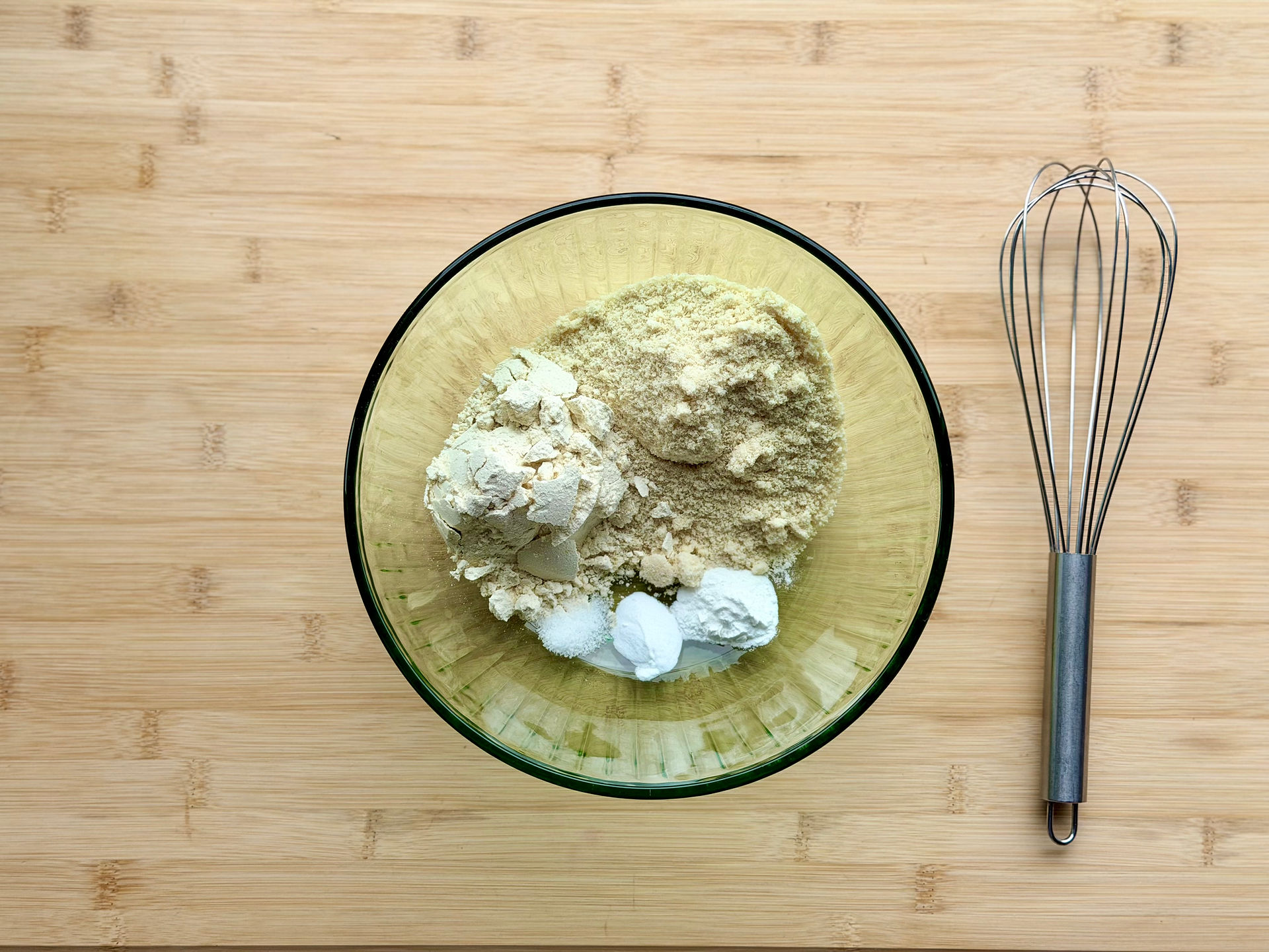 almond flour, 1-to-1 flour, baking powder, baking soda, and salt in a bowl