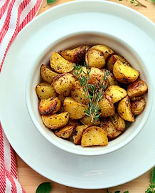 Crispy Roasted Potatoes in a Bowl with herbs