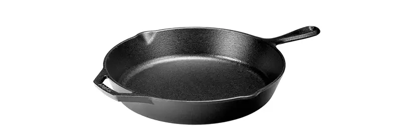 Black cast-iron skillet with handle on a plain white background, isolated product shot