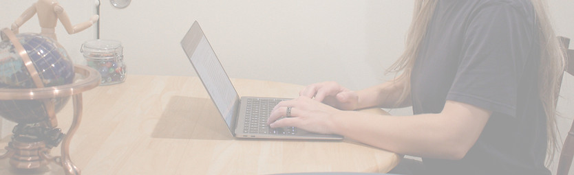 business owner typing on a latptop