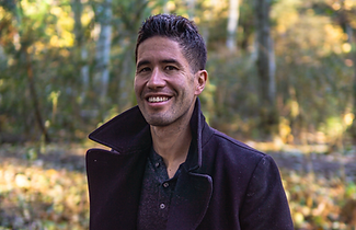 Outdoor Headshot.png