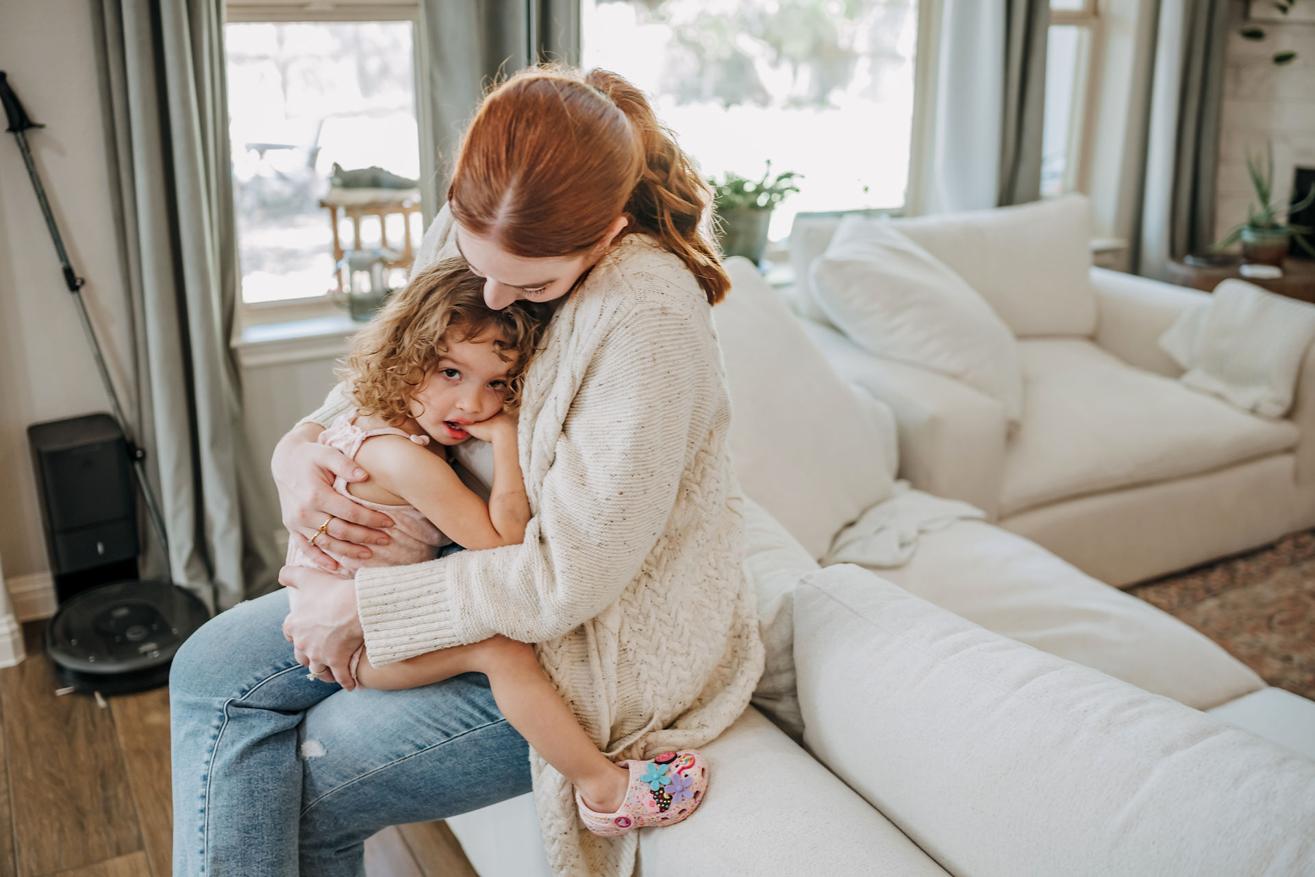 mom and toddler cuddling