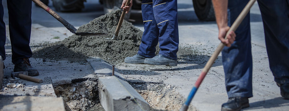 construction-workers-repairing-street-with-shovels-2026-01-08-00-22-58-utc.jpeg