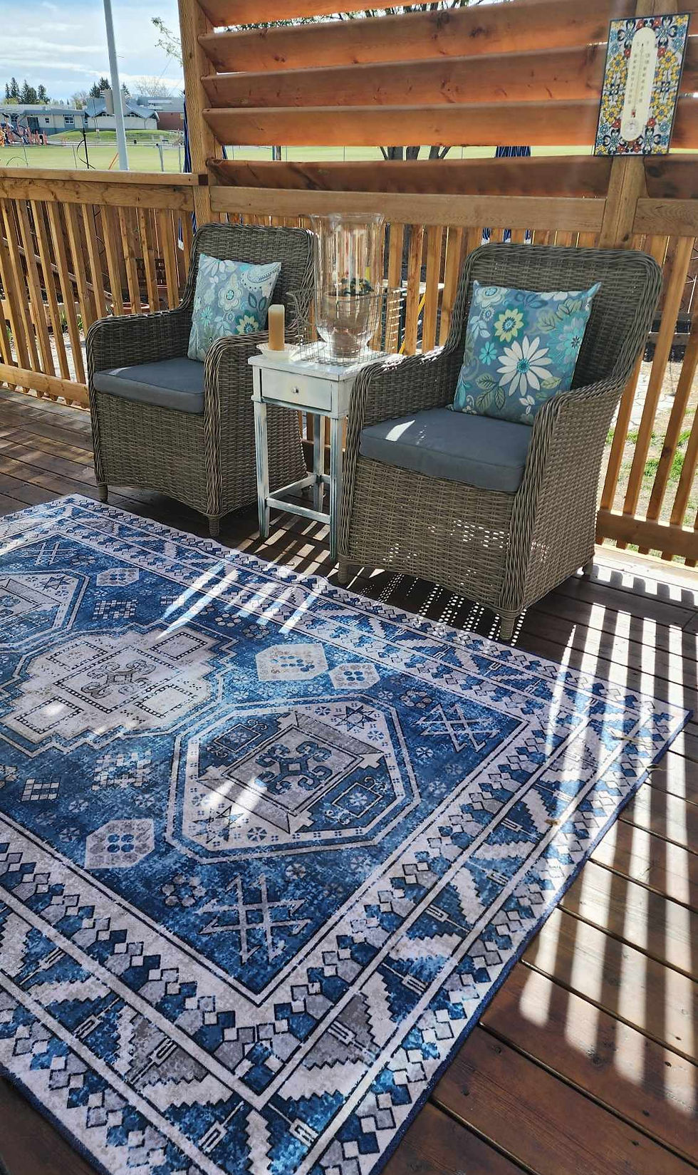 Lovely blue tribal rug out on the deck.