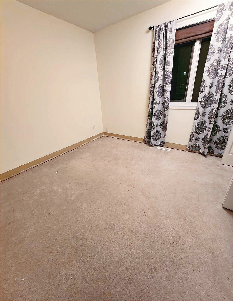 The before picture of a kid's bedroom.