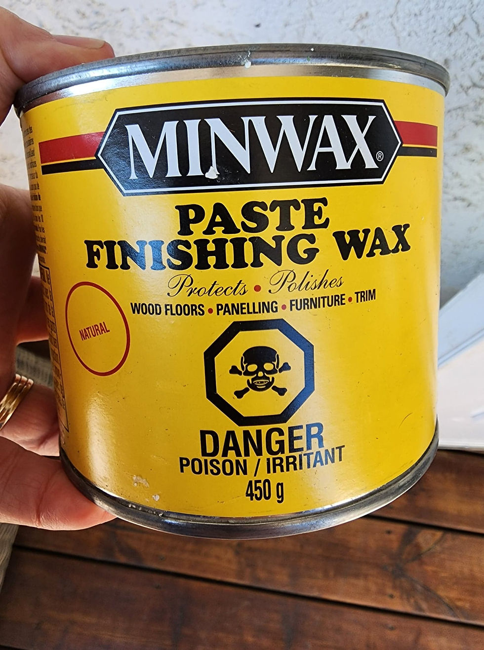 A can of finishing paste wax to protect a table and offer a bit of dinge to make it look more vintage.