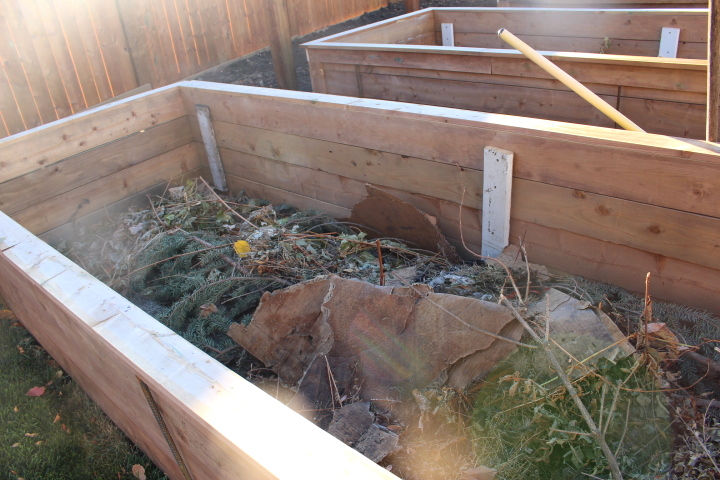 We filled the raised beds half full with all sorts of garden trimmings.