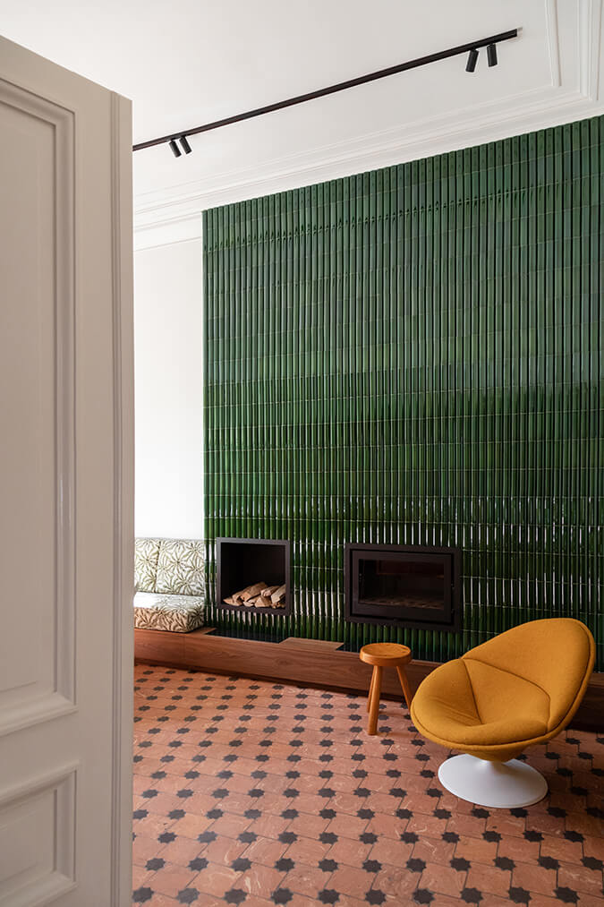 Gorgeous dark green tile wall.