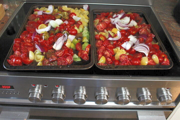 Roasting tomatoes with onions and garlic.
