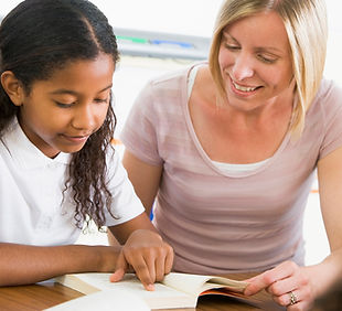 Teacher Helping Student