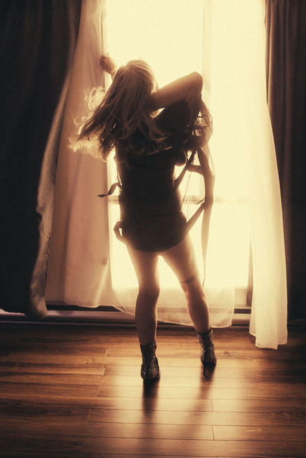 Goddess session by  the window shoot in Luminaire Studio Boudoir Photography in Calgary