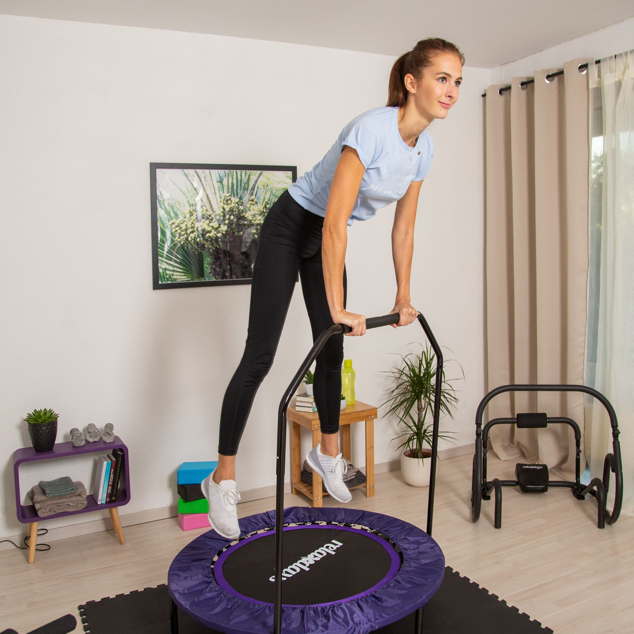 Trampoline foldable with grab bar